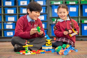 students playing with Lego and Connectables